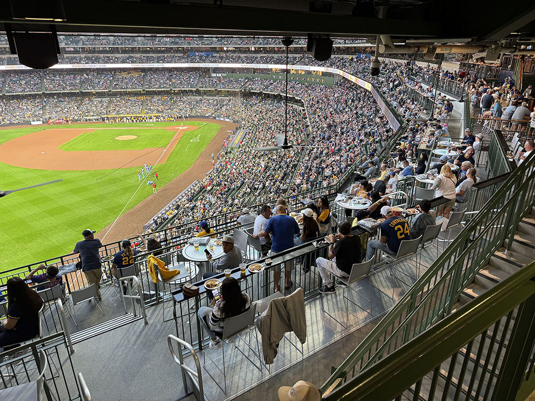 a crowd of people sitting in a stadium