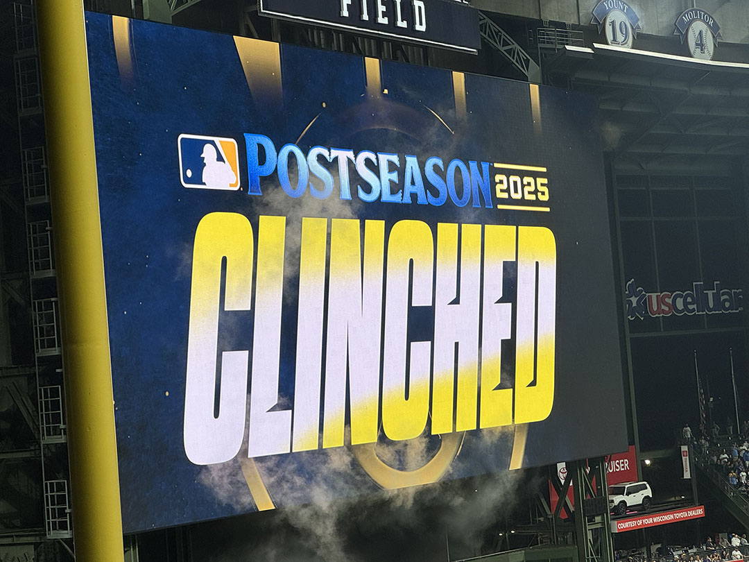 a large sign with text and smoke coming out of it